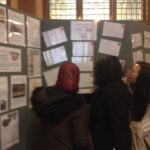Women looking at a notice board